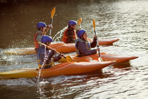 family kayaking