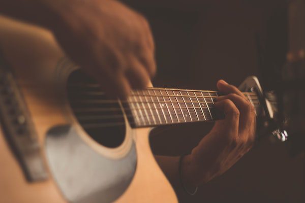 Man playing a guitar